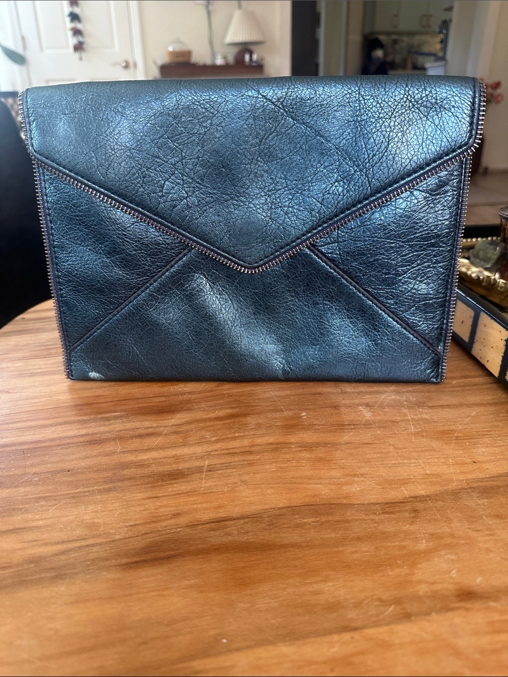 Rebecca Minkoff metallic blue Leather Envelope clutch mark on corner minor wear